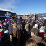 Crowd at the McCall Winter Carnival Parade Svg+xml,%3Csvg%20xmlns%3D%22http%3A%2F%2Fwww.w3.org%2F2000%2Fsvg%22%20width%3D%2